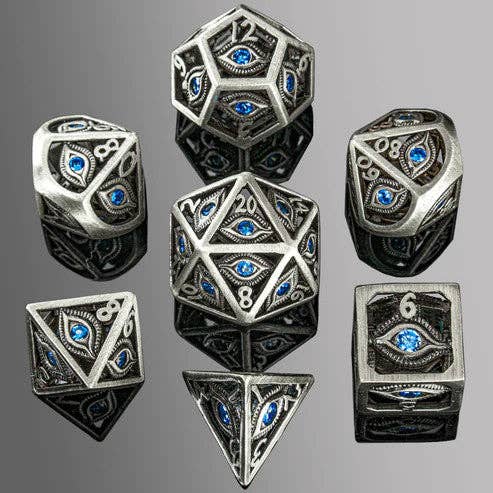 Dragon's Eye hollow metal dice set with aqua blue gems